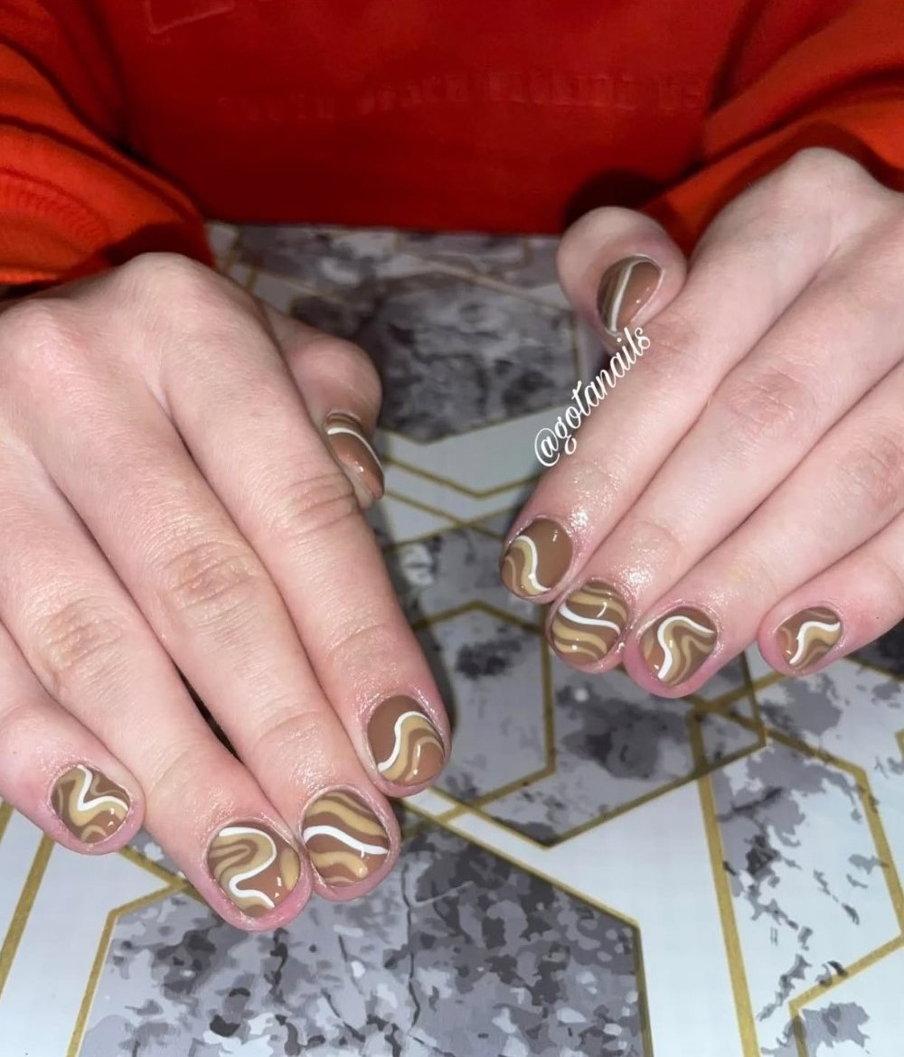 Neutral Brown with White Swirls